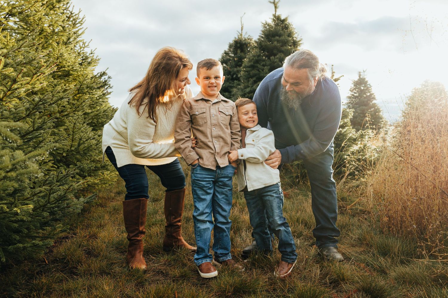 A photo of a family at a Christmas Tree Farm in Walla Walla Washington during sunset