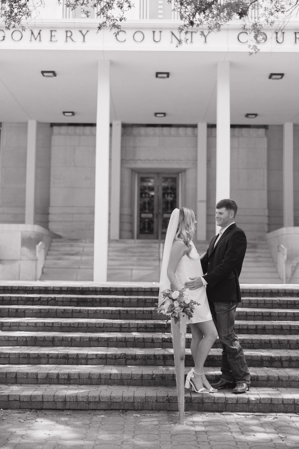 A series of wedding photos showing a couple posing in front of Montgomery County Courthouse.