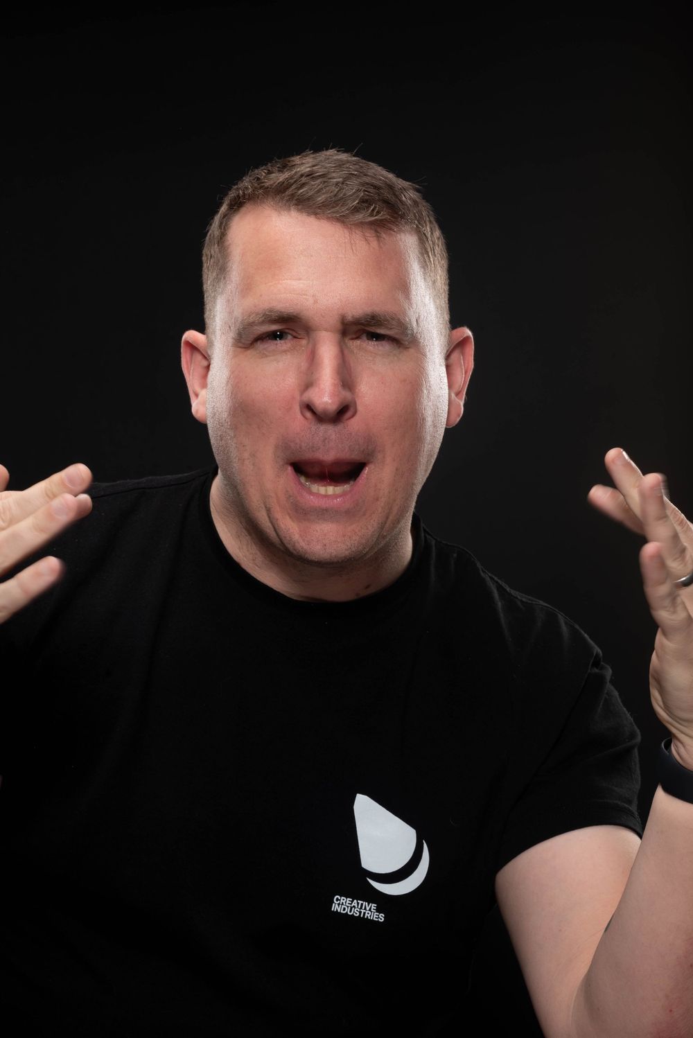 A sequence of expressive facial gestures against a black background shows someone making silly faces and hand gestures.