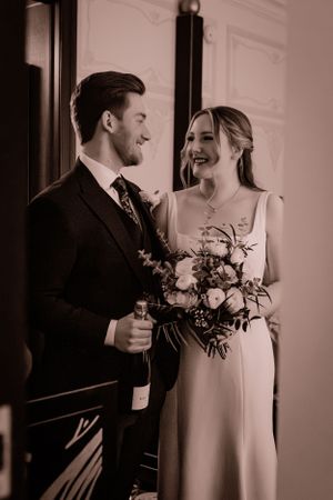 couple sharing a quiet moment before they are announced