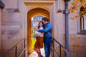 husband wife share a perfectly posed hug