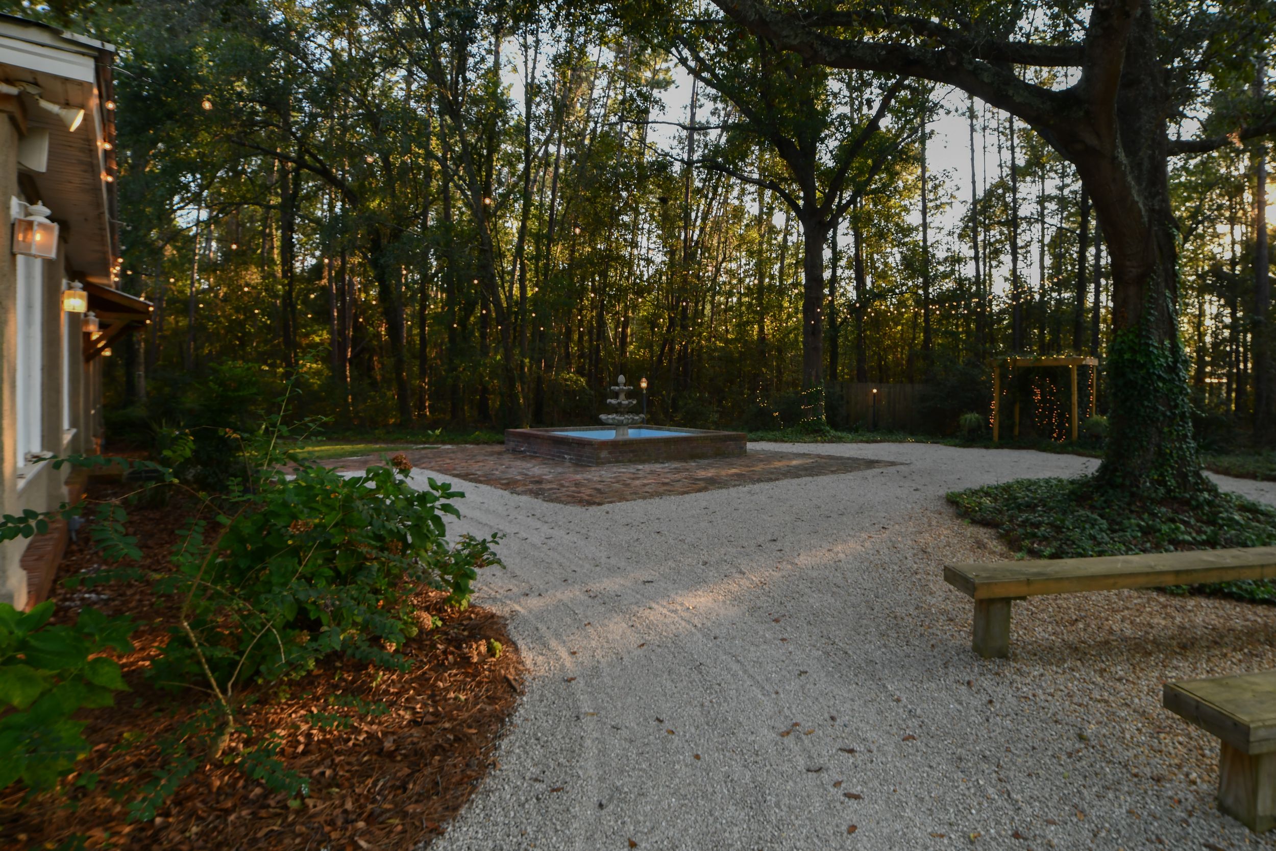 Wayne County, Pierce County, Ware County, Long County wedding venue for special events, courtyard, outdoor area with lights and trees.