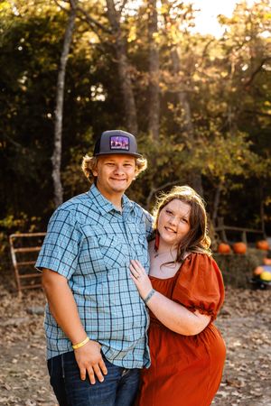 A young couple in fall golden hour
