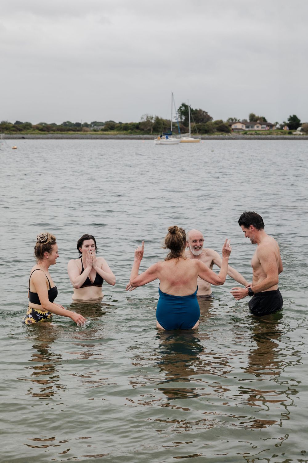 a group of people enjoying sauna and cold swims in Rinville, Oranmore