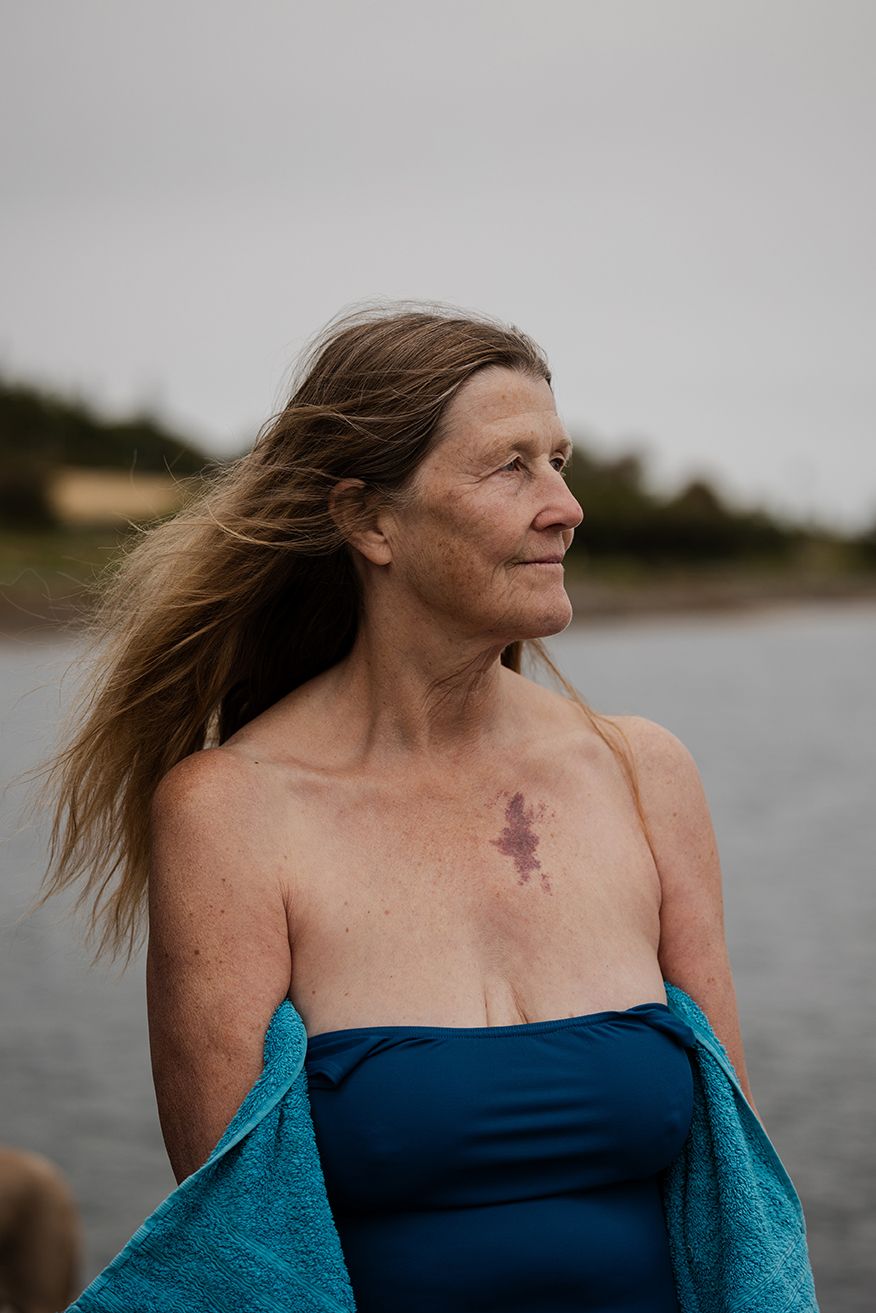 an elderly woman enjoying sauna and cold swims in Rinville, Oranmore