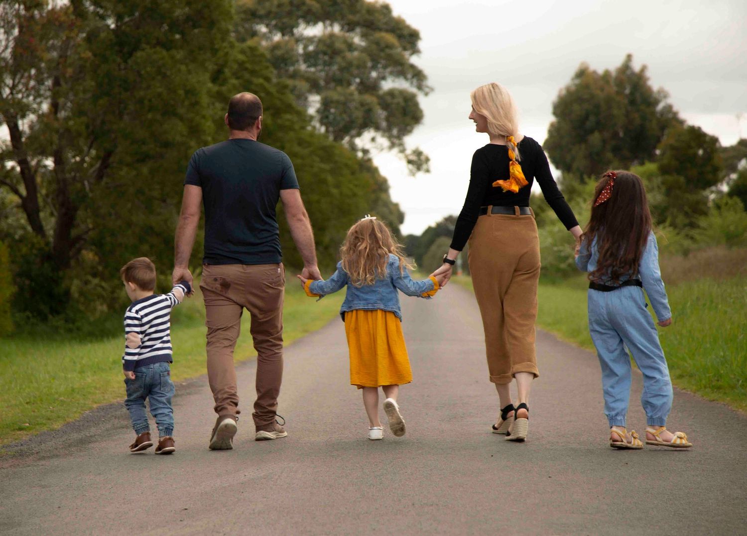 Candid family moment during a sunset session in rural Victoria.