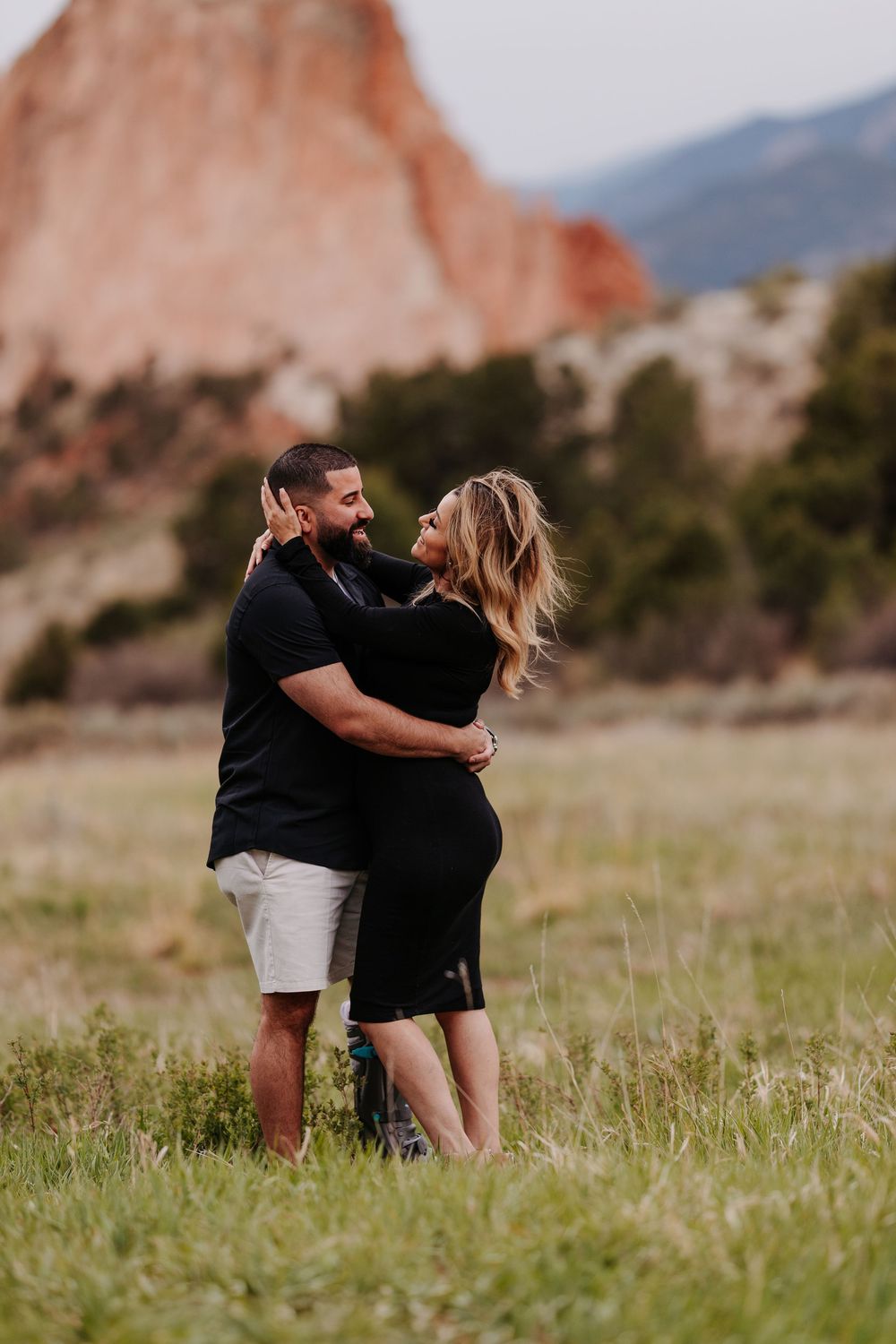 couple in front of garden of the gods