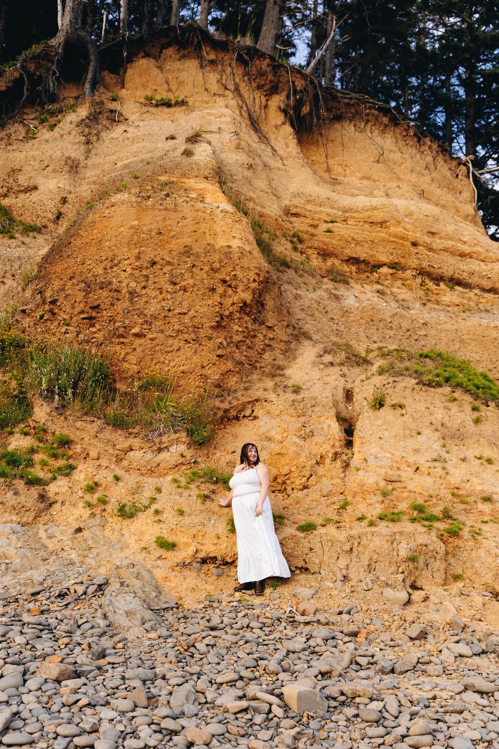 A series of photos showing a rocky beach with a steep sandy cliff face and someone in white clothing against the natural backdrop.
