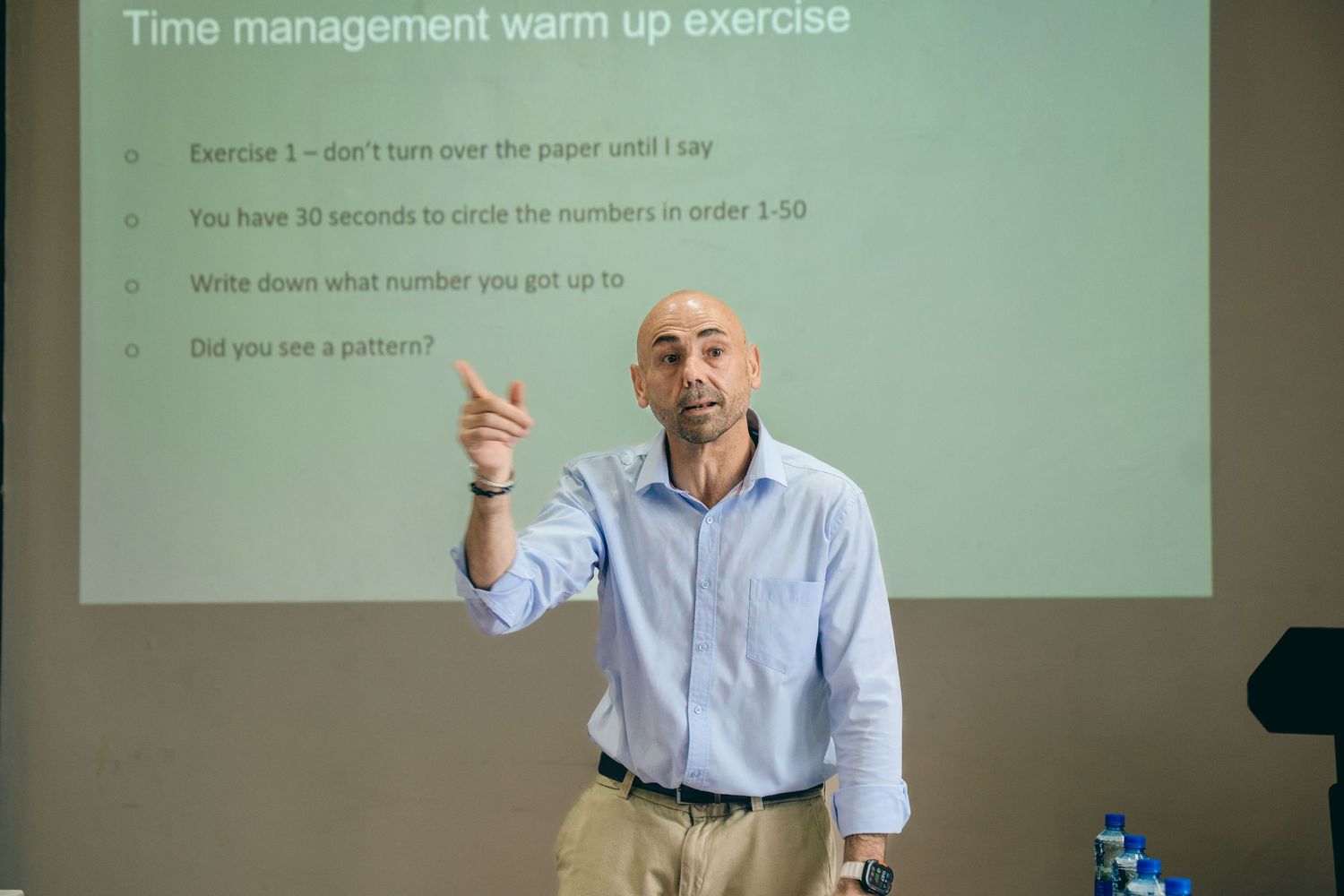 A speaker derivering insights during a live session. This frame captures more than a presentation it reflects the power of human connection.