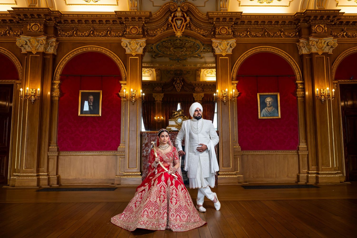 Gujarati & Sikh wedding couple inside Hylands Estate ballroom, Essex. Indian wedding photography & cinematography by Foto Collective