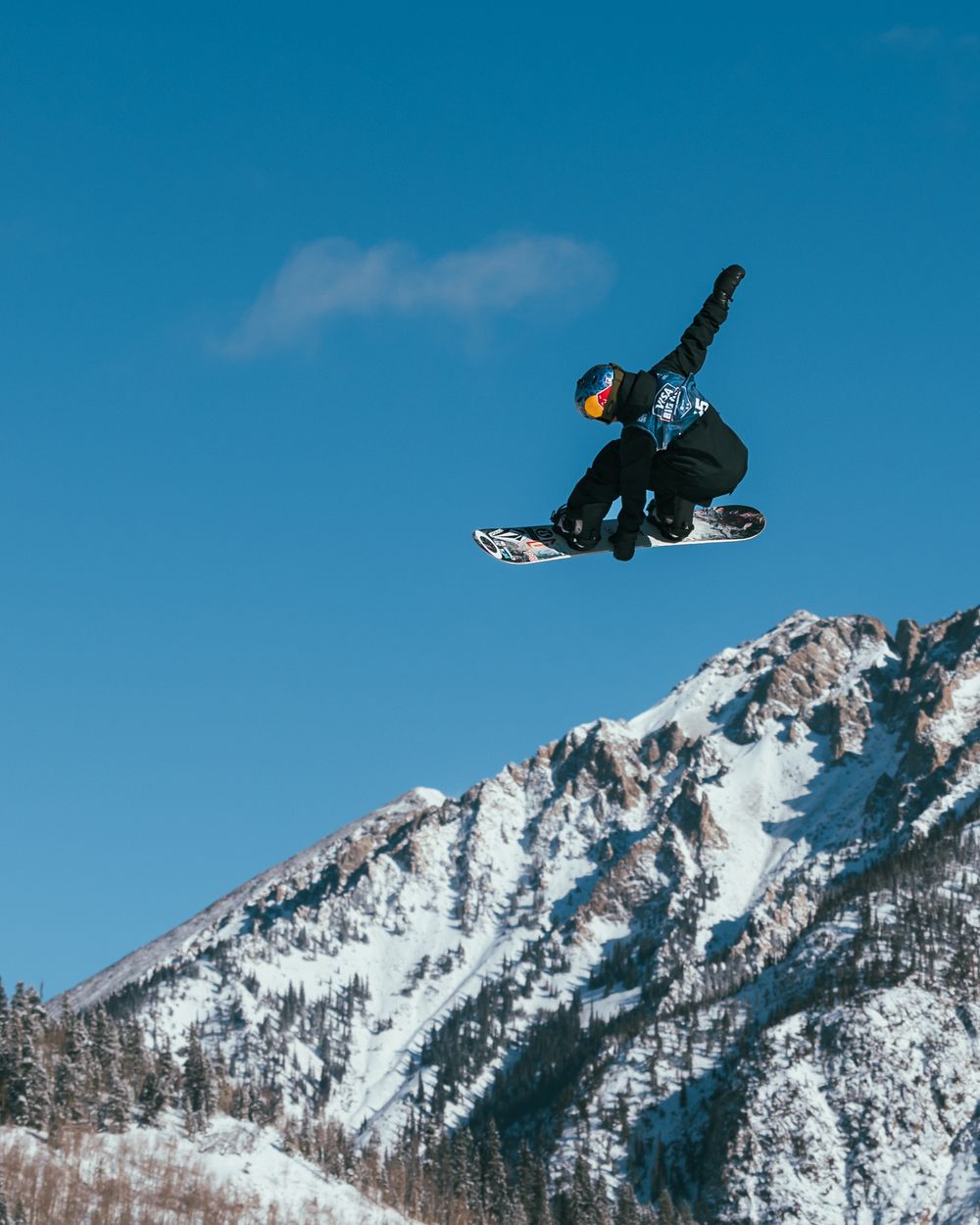 Snowboarder does trick at 2022 Visa Big Air competition at Copper Mountain, CO. Sports Photography