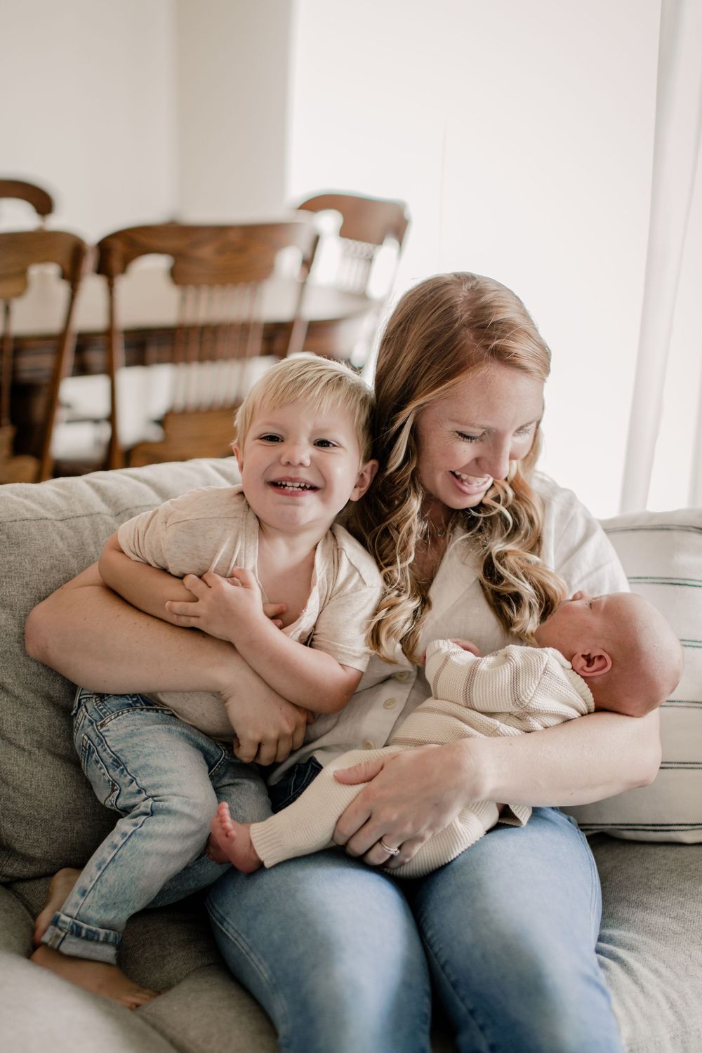 A heartwarming series of candid family moments showing siblings bonding and sharing laughter together on a couch.