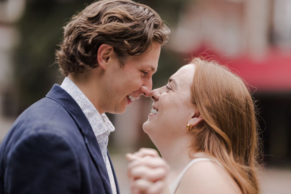 A couple shares romantic moments in a series of candid outdoor photos showing them smiling and embracing.