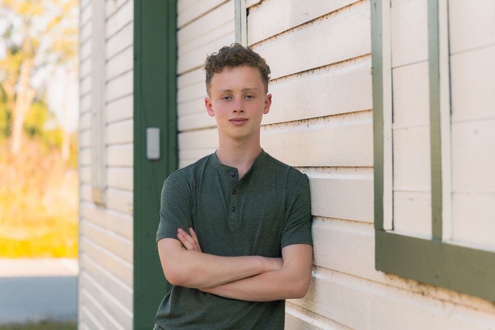 madison wi high school senior photographer yearbook photos professional lake kegonsa state park boardwalk boy with dog mcfarland stoughton