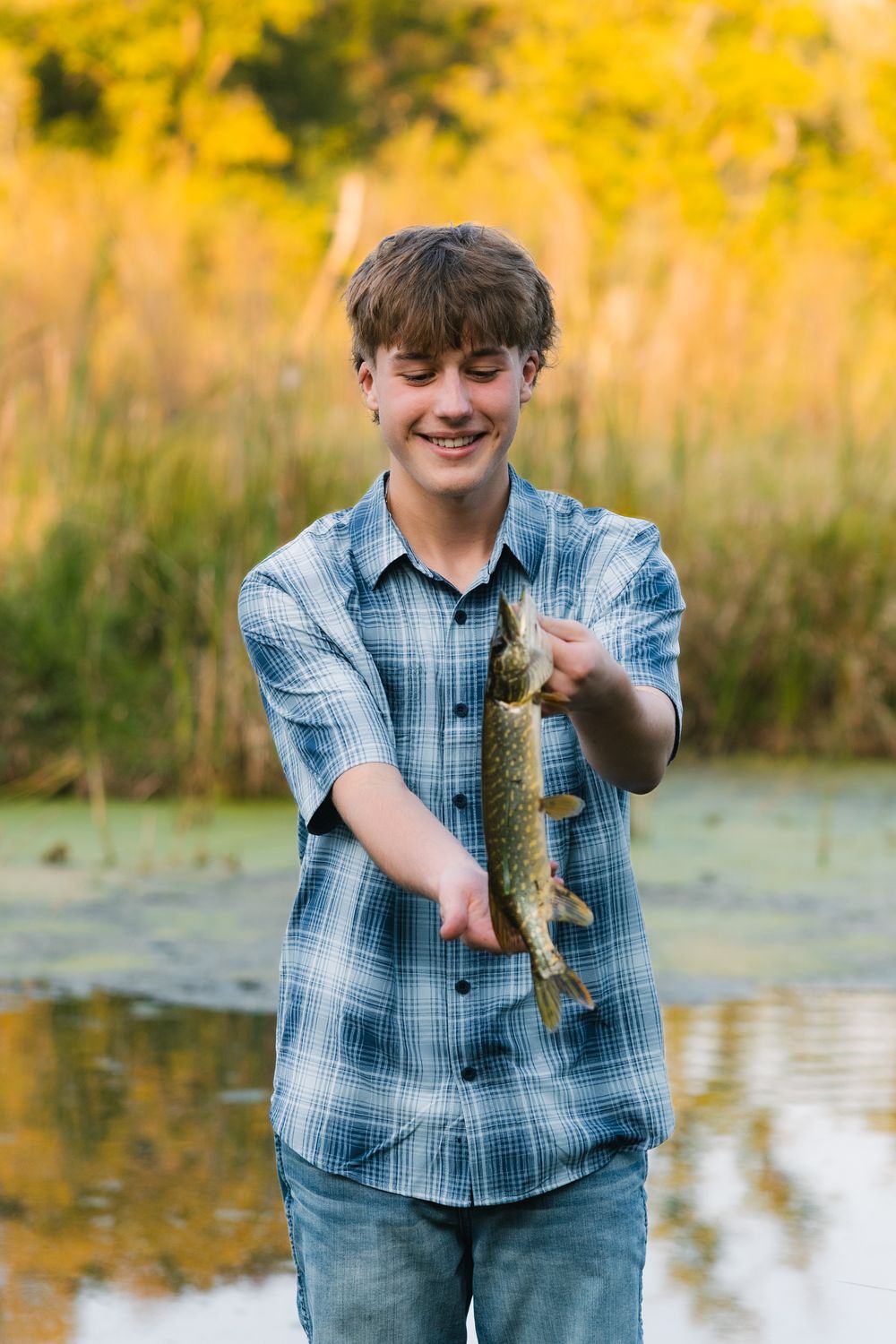 madison wi high school senior photographer yearbook photos fishing boy hobby pheasant branch conservancy middleton verona waunakee mcfarland