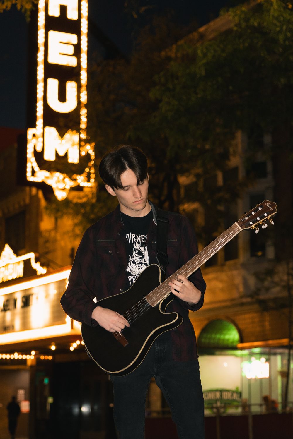 madison wi high school senior yearbook photographer unique photos boy playing electric guitar orpheum theater downtown urban night pictures