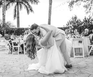 A sequence of black and white wedding photos showing dancing and celebration at an outdoor reception.