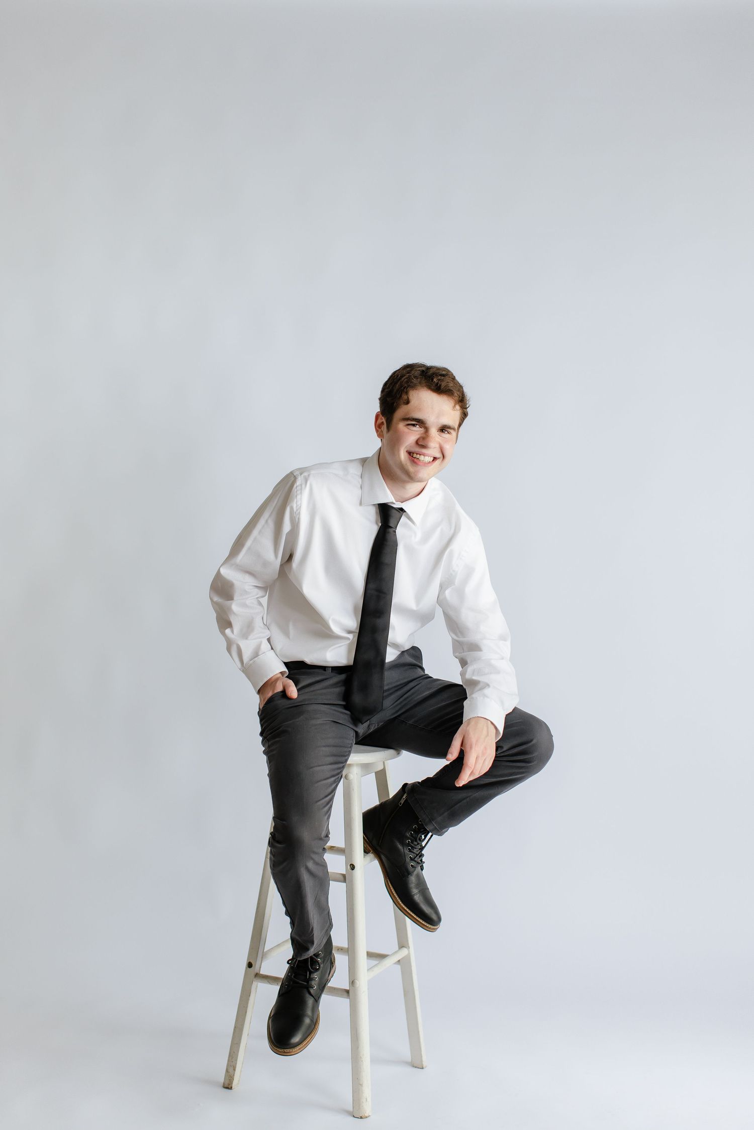 Senior boy session, graduation photos, in Zionsville, Indiana studio