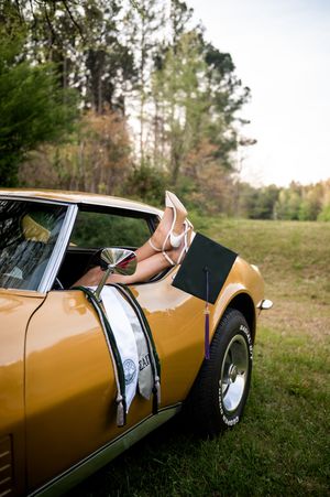 Close-up details of a vintage gold-colored sports car shot from various angles on grassy terrain.