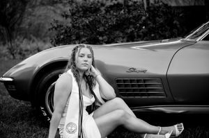 Black and white artistic shots featuring a classic car with sleek retro styling.