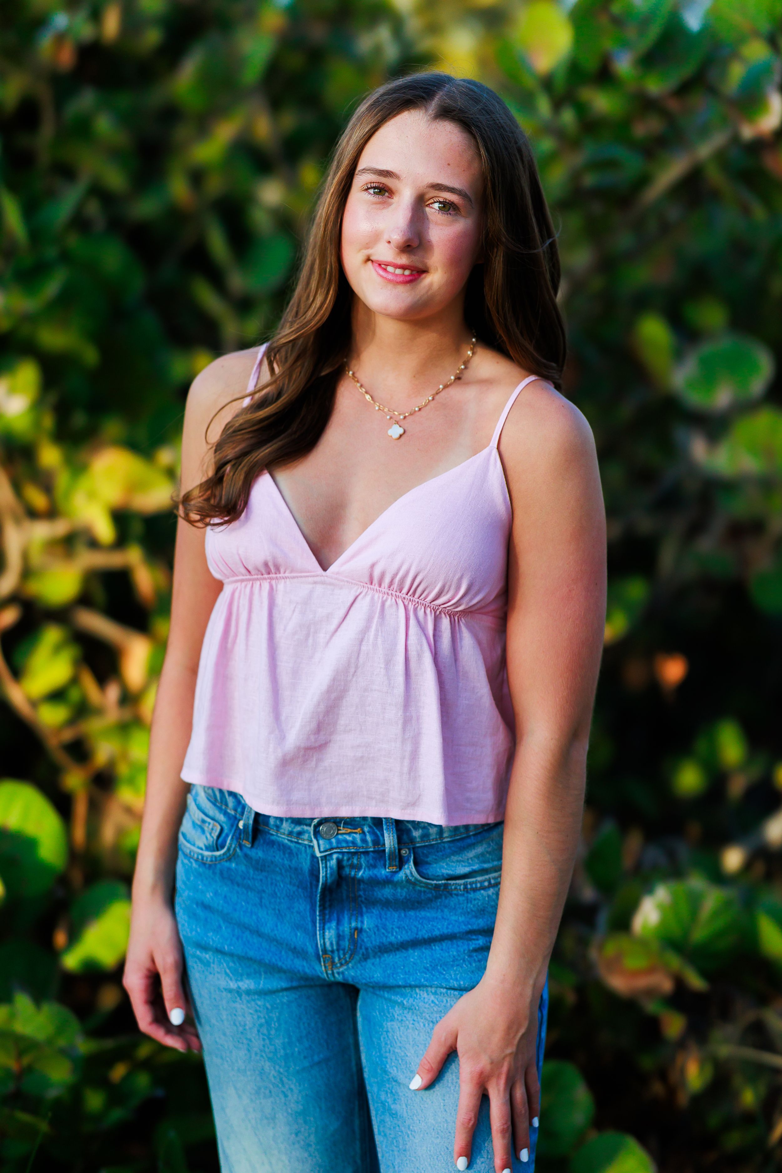 Portrait series showing joyful expressions and blonde hair against a soft blurred outdoor background.