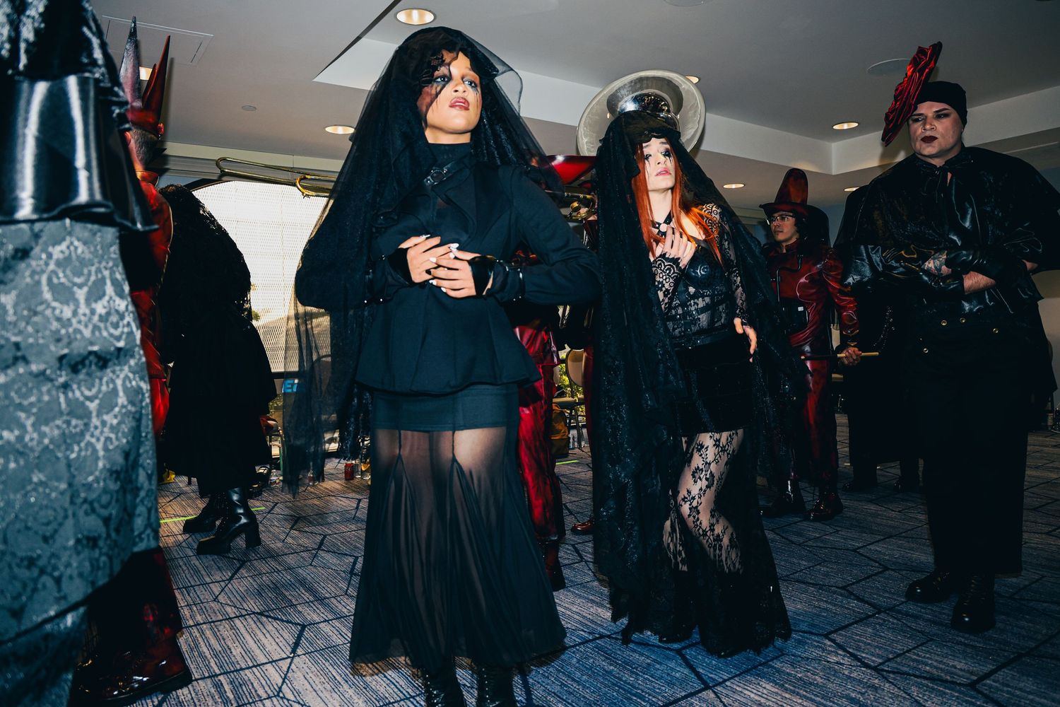 Behind the scenes of Lady Gaga's stunt for the premiere of Mayhem Requiem at The Grove in Los Angeles, CA. Dancers rehearsing.