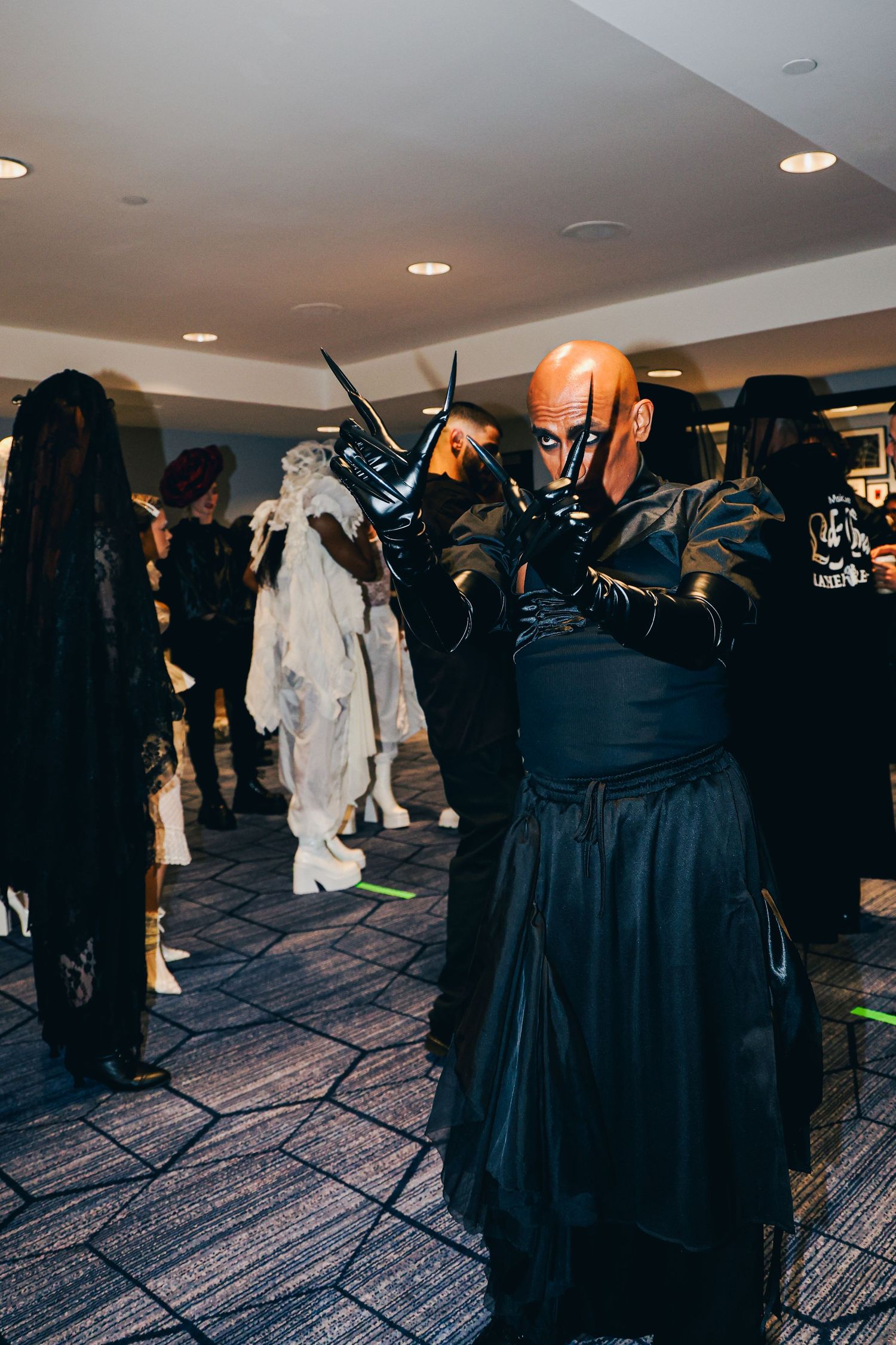 Behind the scenes of Lady Gaga's stunt for the premiere of Mayhem Requiem at The Grove in Los Angeles, CA. Dancers rehearsing.