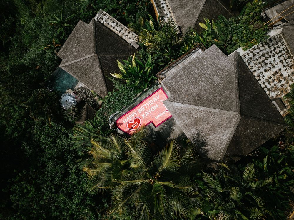 Drone photography capturing a birthday celebration at The Kayon Jungle Resort.