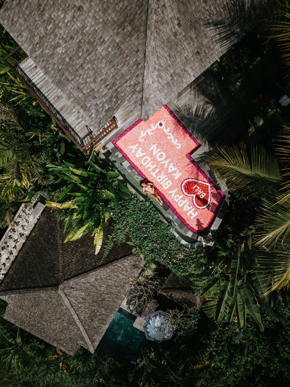 Drone photography capturing a birthday celebration at The Kayon Jungle Resort.