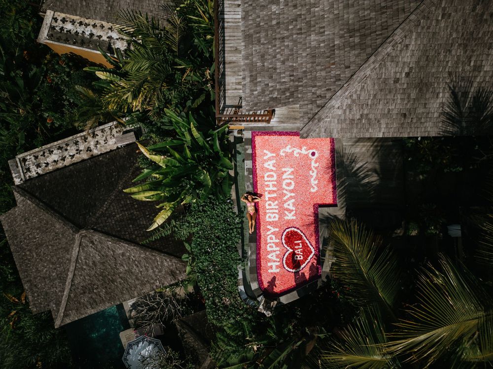 Drone photography capturing a birthday celebration at The Kayon Jungle Resort.
