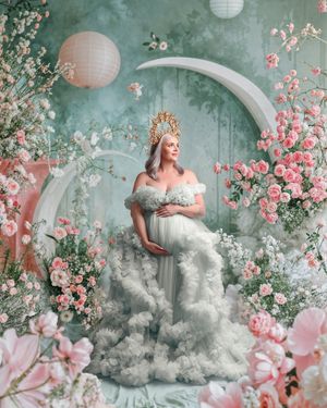 Luxury maternity: woman in a pale mint coloured couture gown, artfully captured in the studio by Caz Captures.
