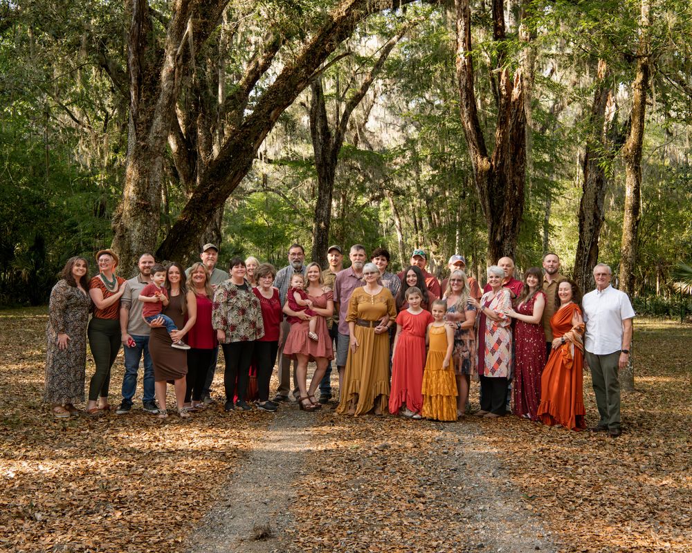 Multi-generational family photo session near Tampa, FL, featuring great grandparents, grandparents, parents, children, and grandchildren.