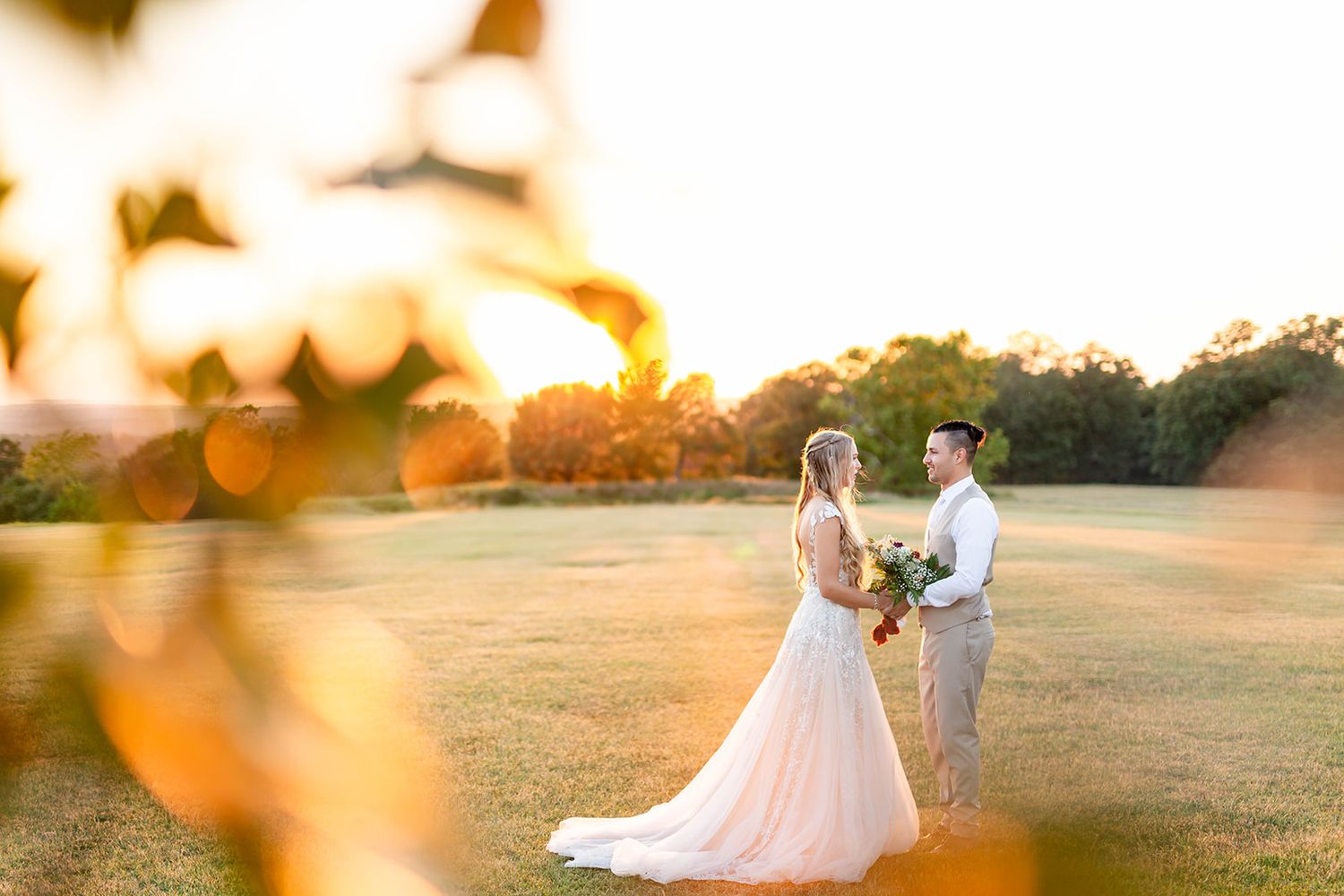 Bride and groom at golden hour in an open field during a destination wedding in Oklahoma