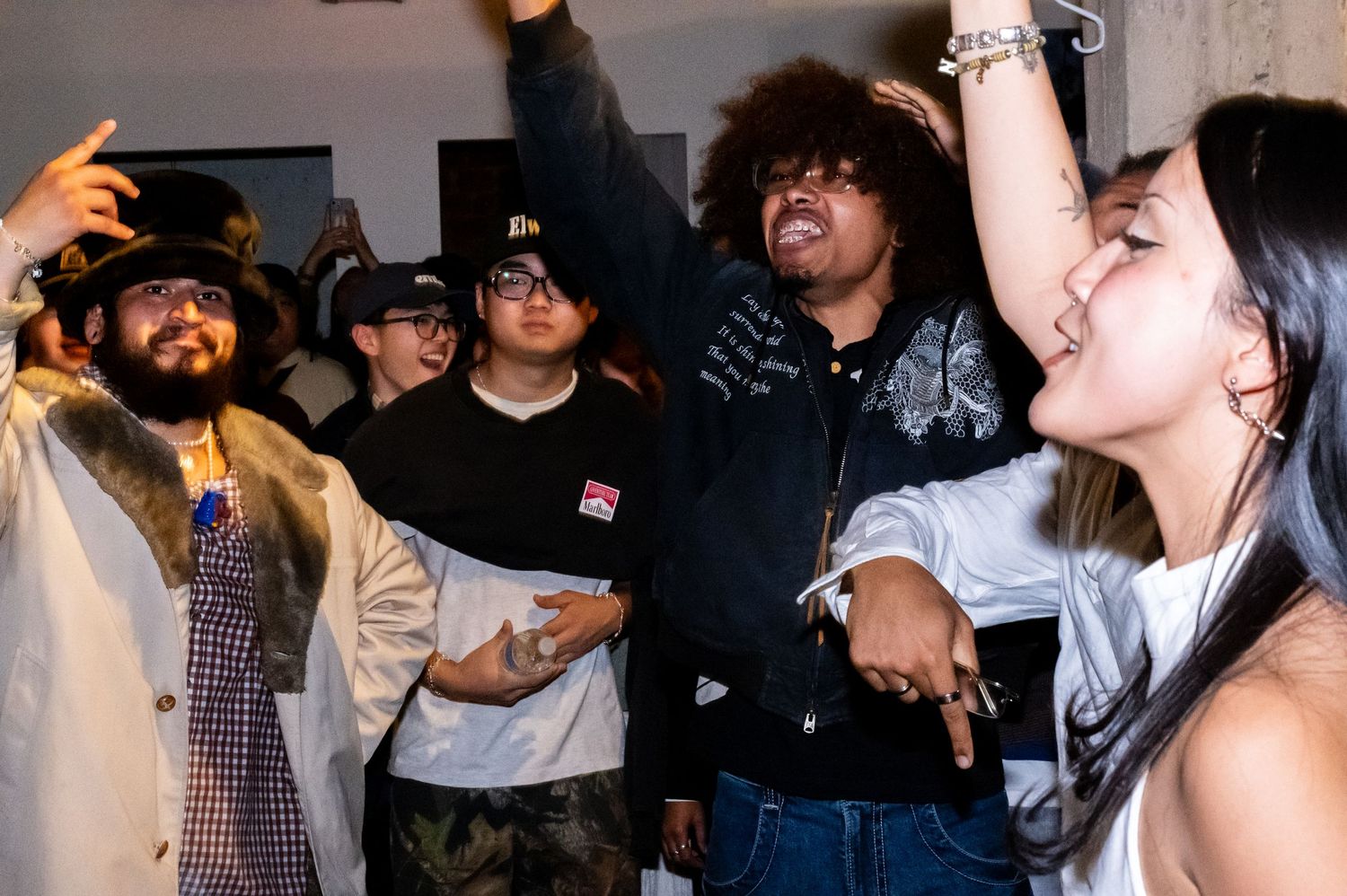 Photo from Bittertones x Market Event. The crowd shows excitement during Zarstuh's set. Naveah cheers the crowd on.