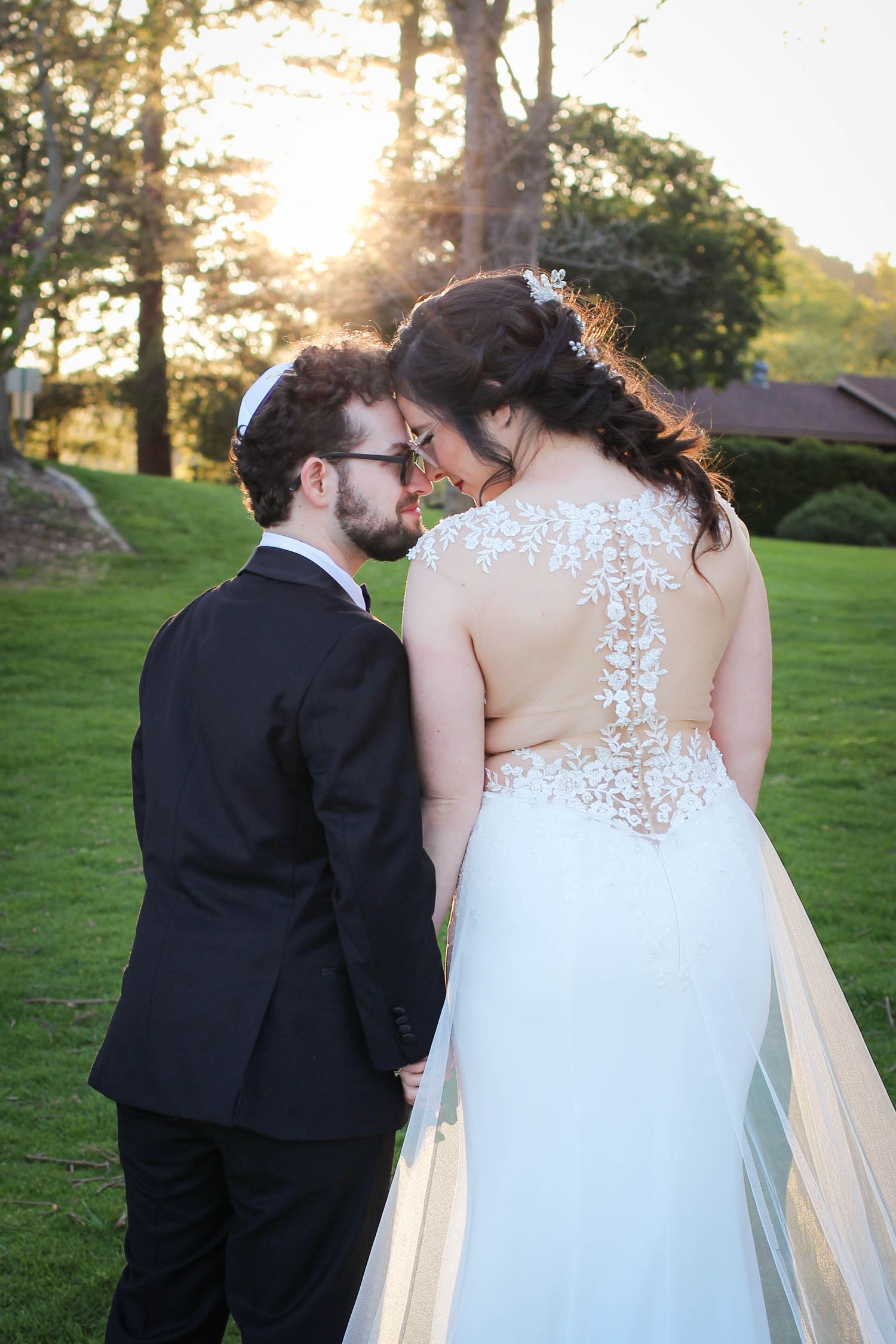 Religious bride and groom during sunset in San Luis Obispo (Atascadero) wedding