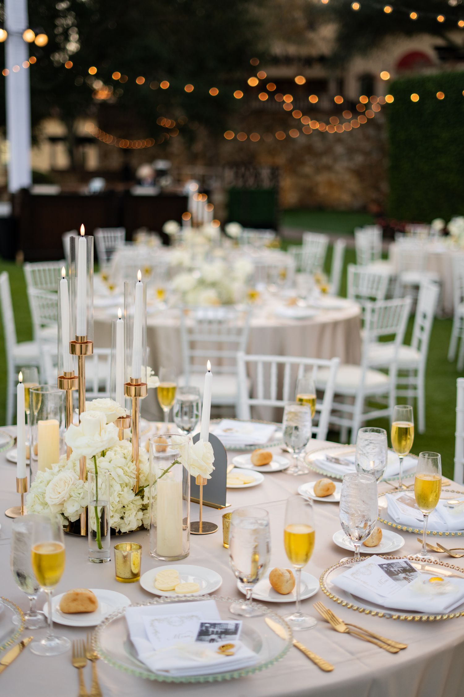 Outdoor dinner reception table setup Bella Collina wedding Florida Weddings by Ray