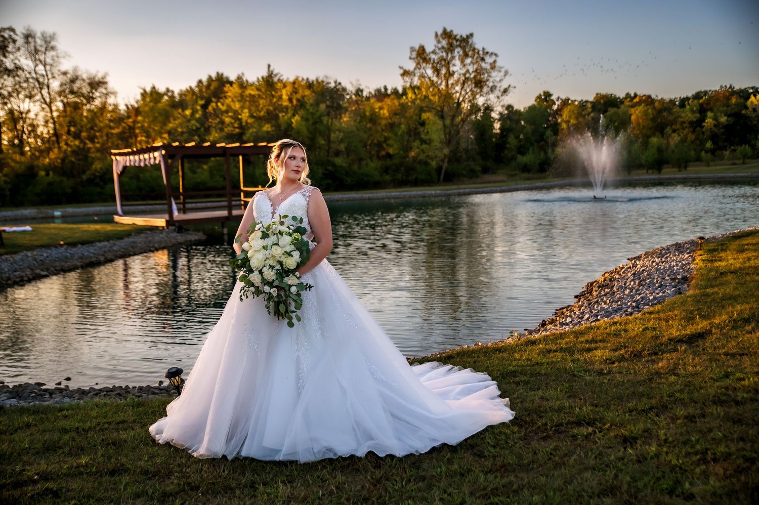Bride posing outdoors in her wedding dress during a West Central Ohio wedding