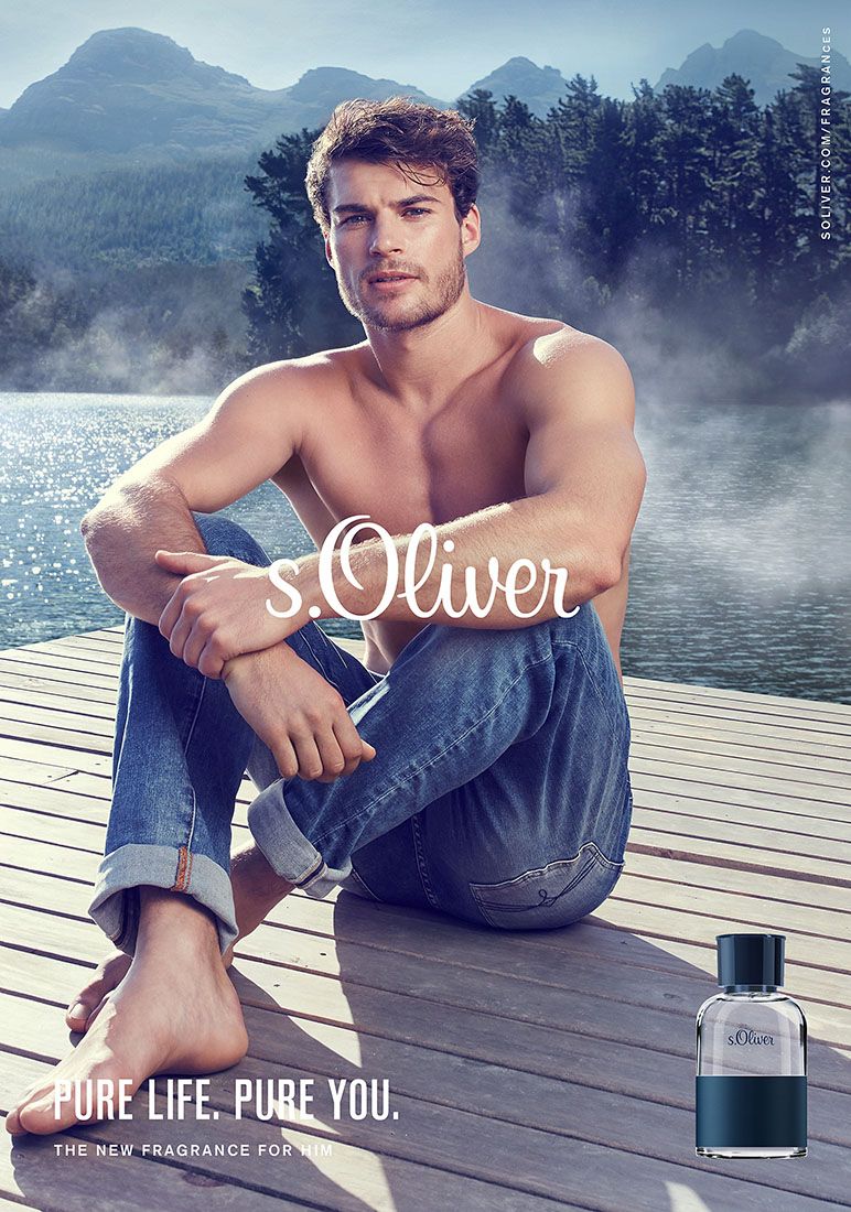 s.Oliver Pure Life Pure You mens fragrance ad with shirtless man in jeans on misty lake dock.