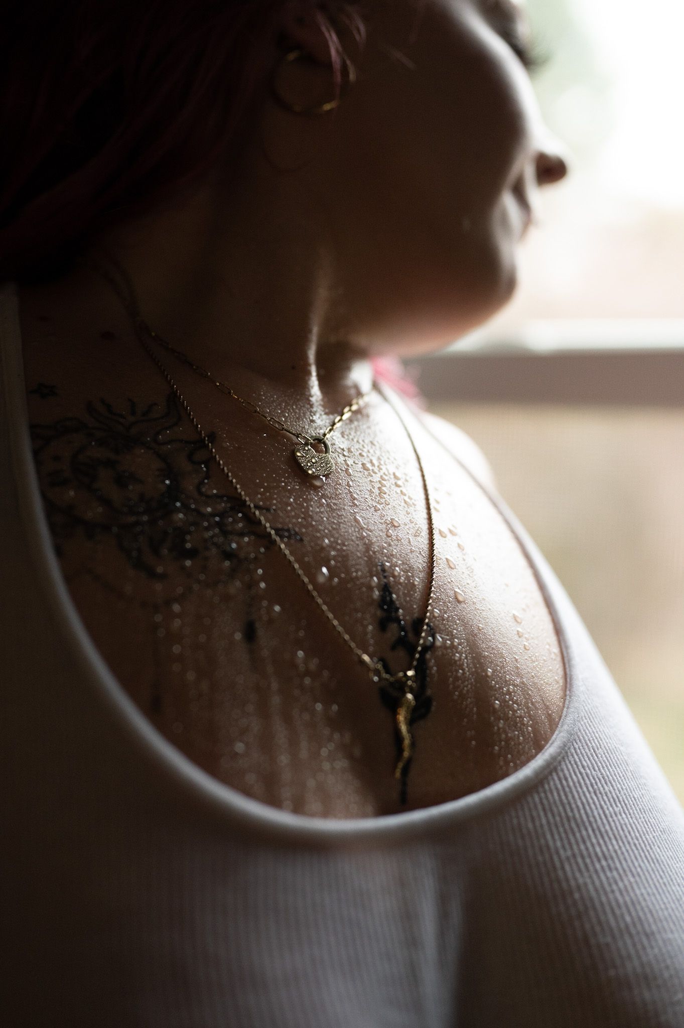 woman boudoir with water details on chest