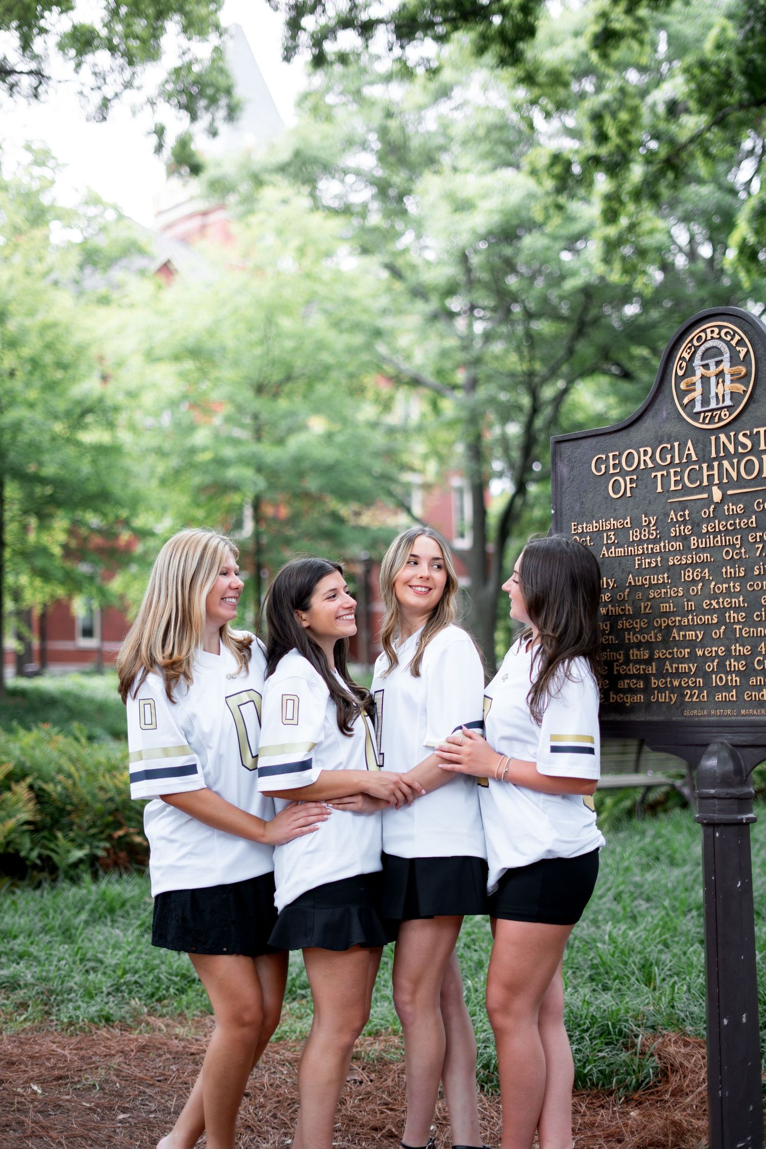 group grad photos at Georgia Tech during a cloudy day by atlanta graduation photograher Pierre