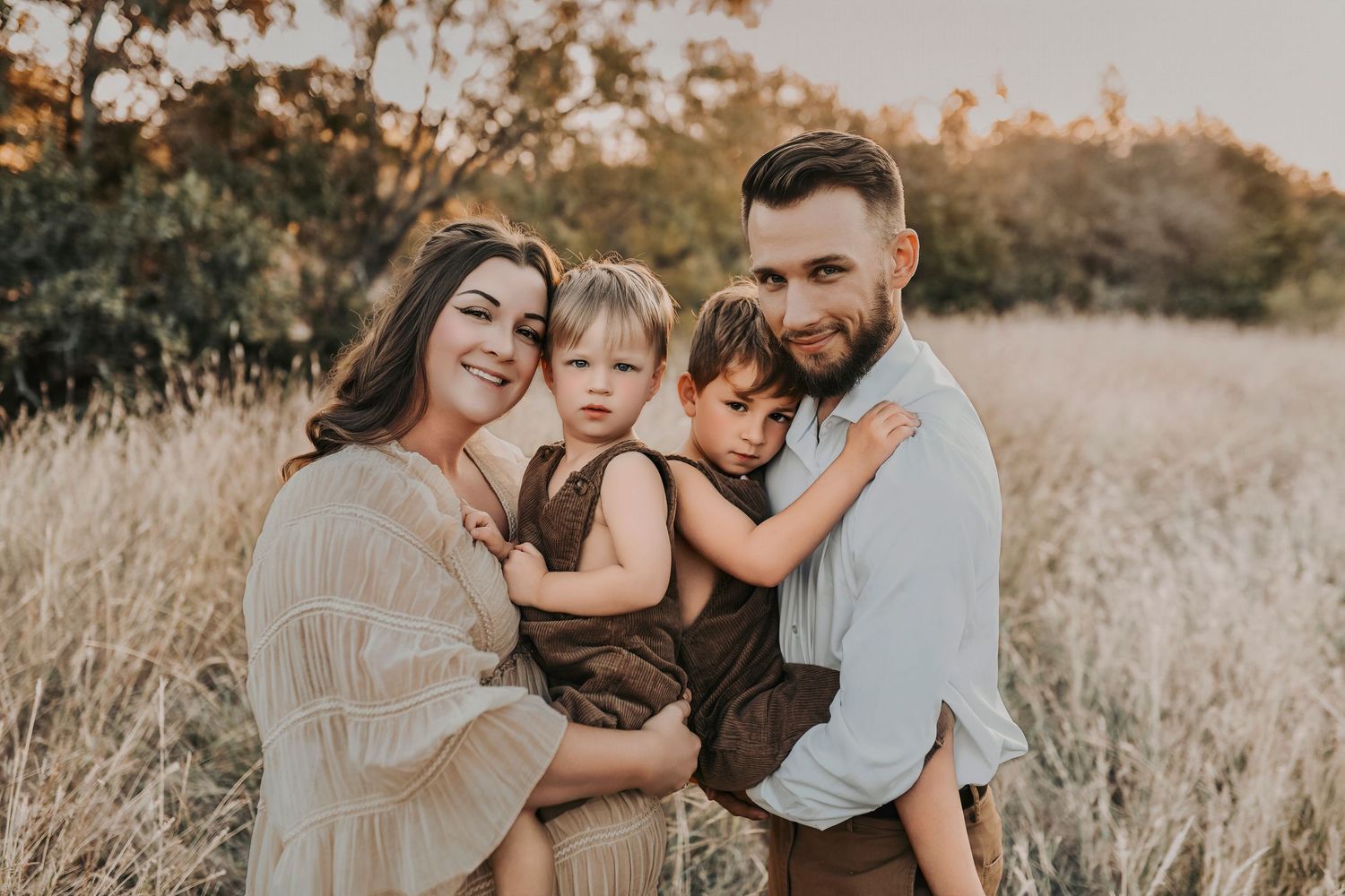 Dallas maternity photographer capturing authentic moments between parents and young children