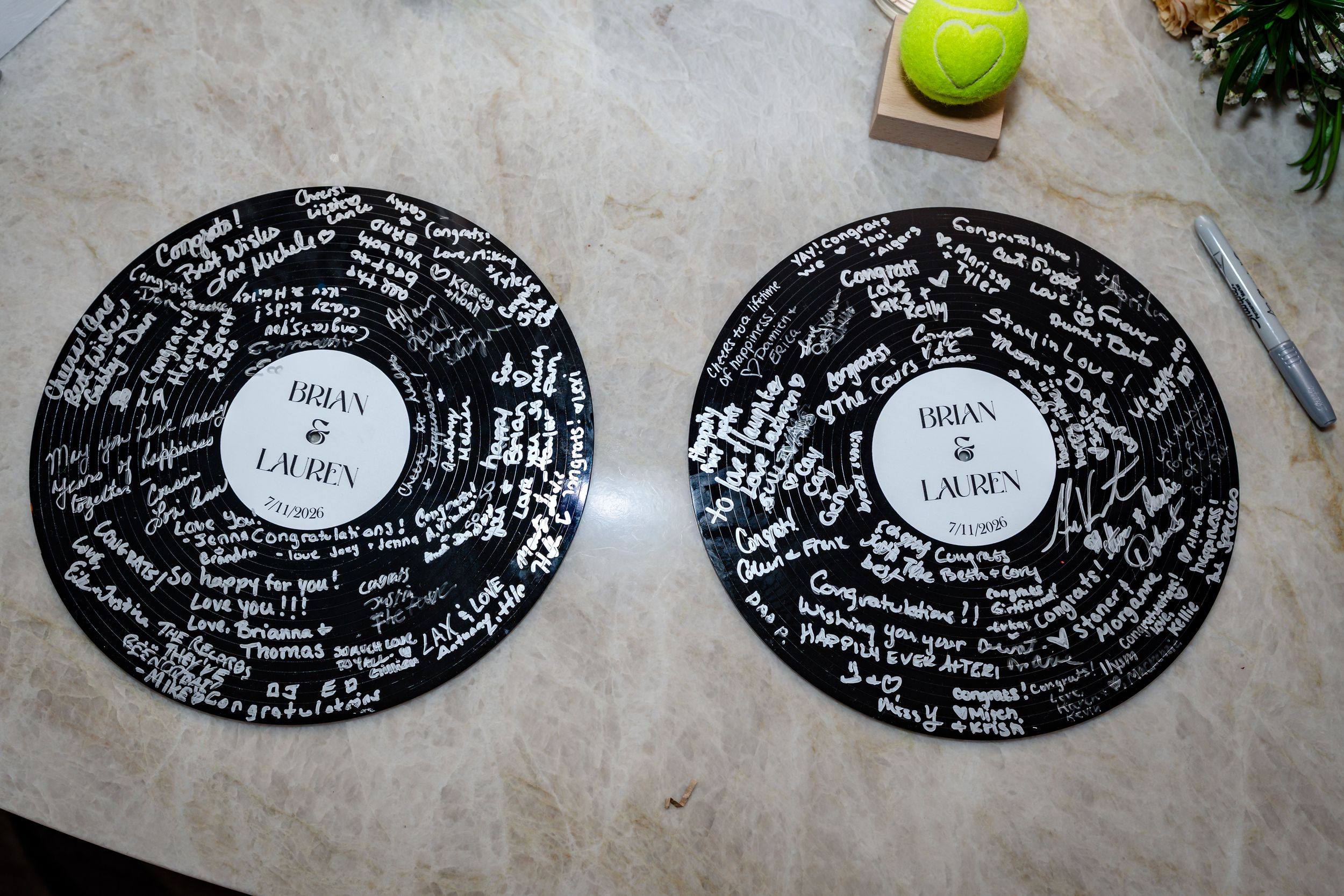 Custom vinyl record wedding guest book signed by guests with bride and groom names Brian and Lauren.