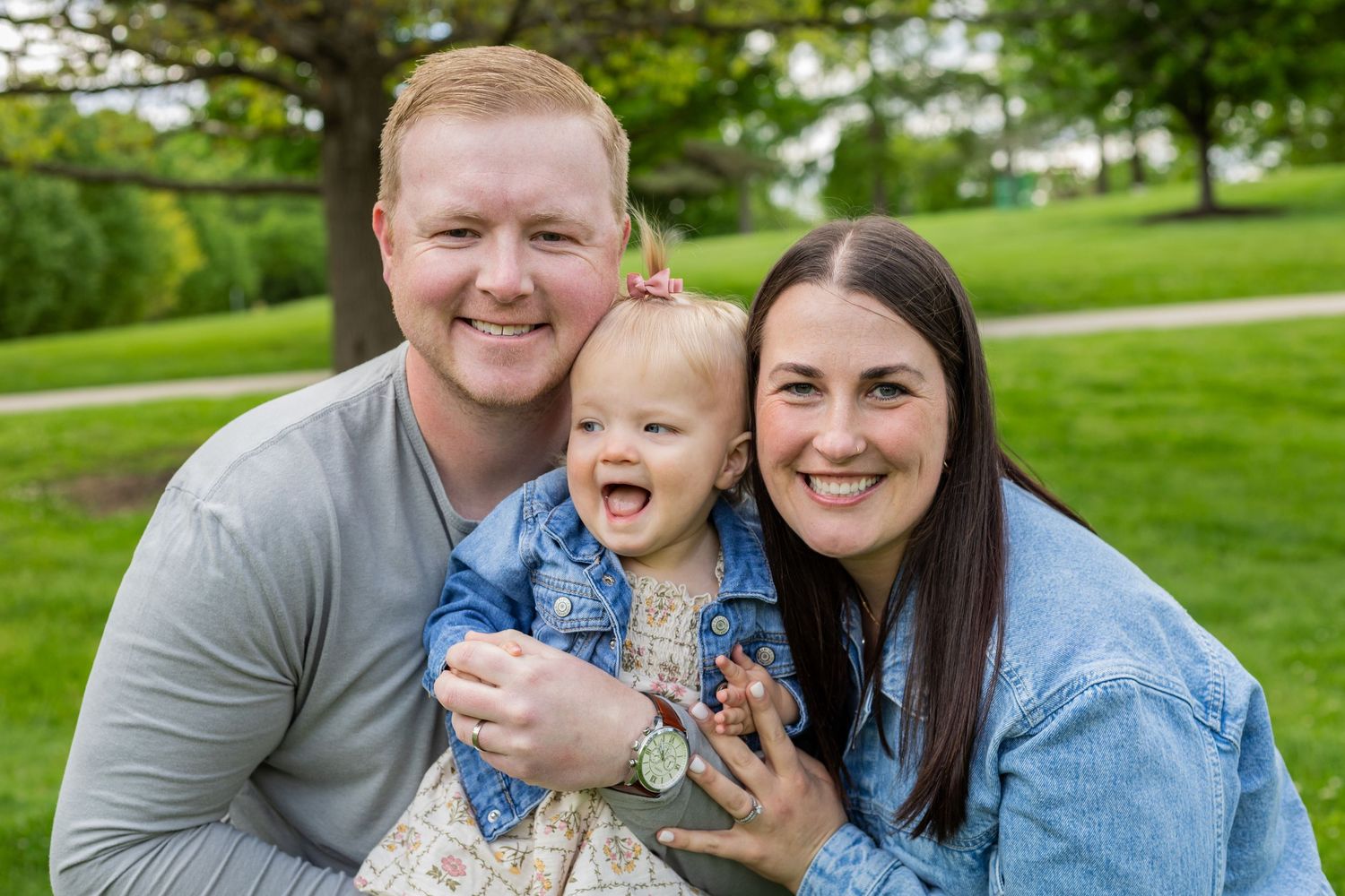 Family photo with mom, dad, and baby girl
