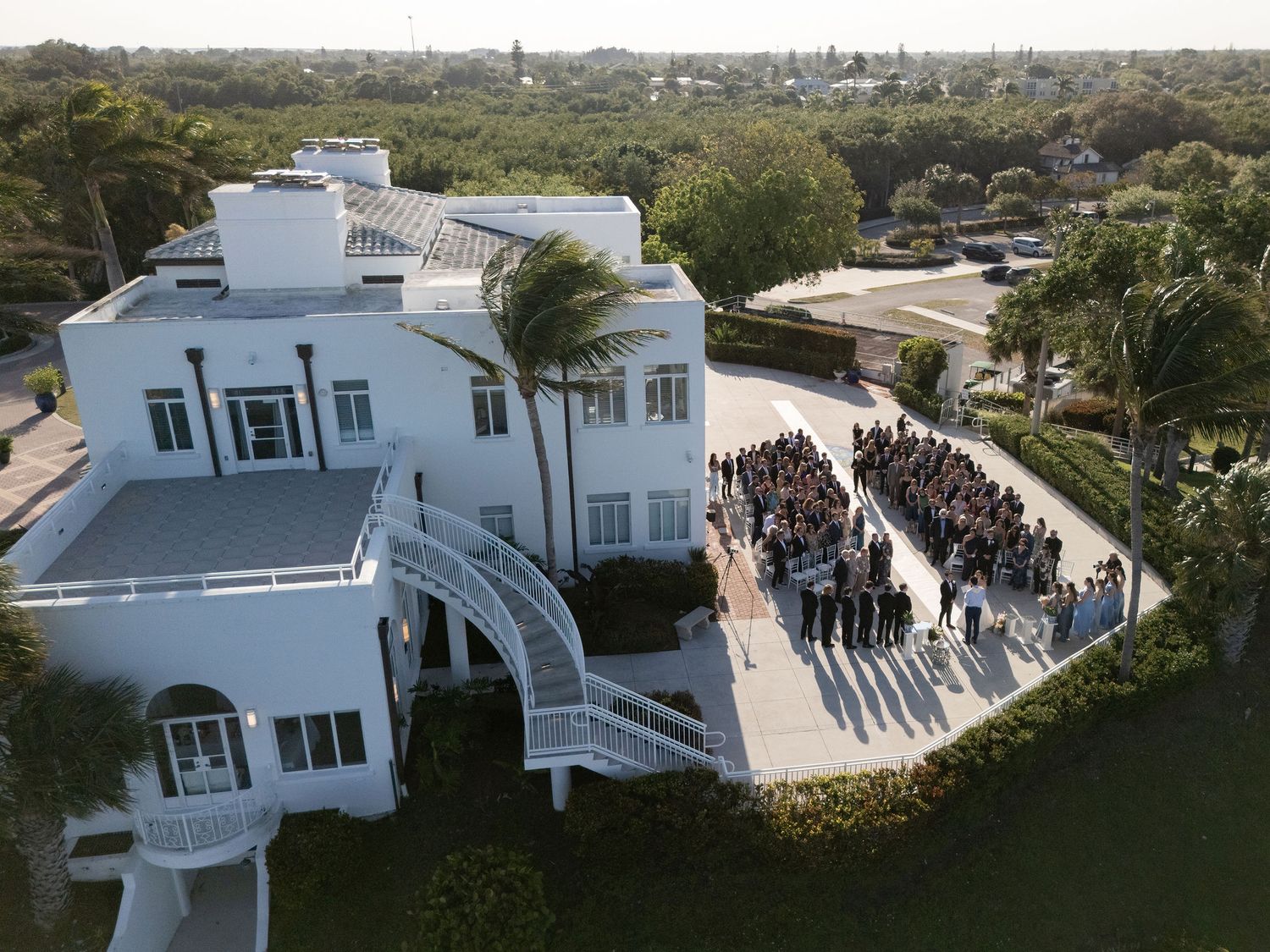 Aerial view of a wedding ceremony on the North Terrace at the Mansion at Tuckahoe
