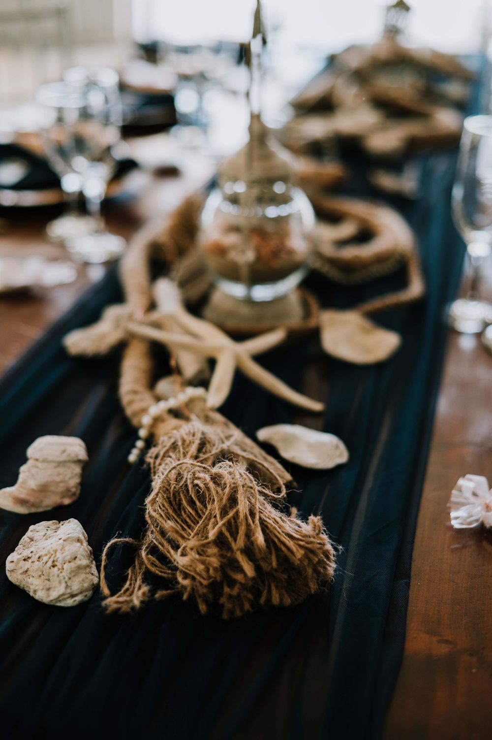 Ocean-inspired wedding décor in elegant shades of blue and gold at Gourikwa Reserve, featuring coastal details and sophisticated style
