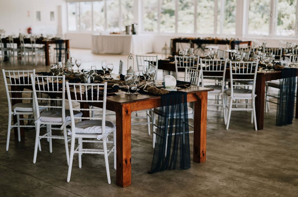 Ocean-inspired wedding décor in elegant shades of blue and gold at Gourikwa Reserve, featuring coastal details and sophisticated style