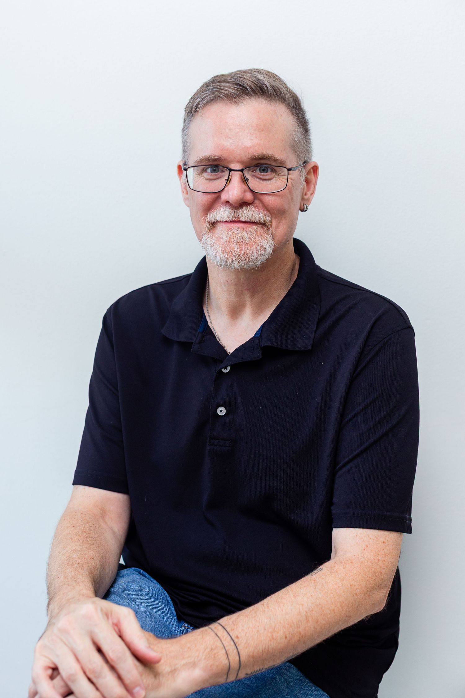 Headshot of a man against a white background. Guaynabo, Puerto Rico.