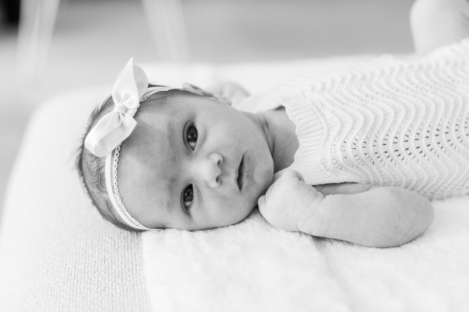 Black-and-white portrait of a newborn. In-home lifestyle newborn session in Guaynabo, Puerto Rico.
