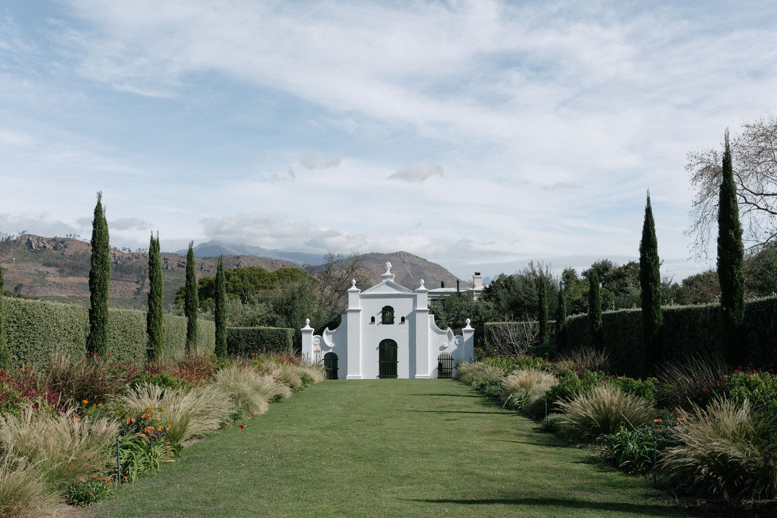 Browse Cape Winelands wedding venues for real weddings by Christene de Coning Photography at La Cotte Farm, Franschhoek