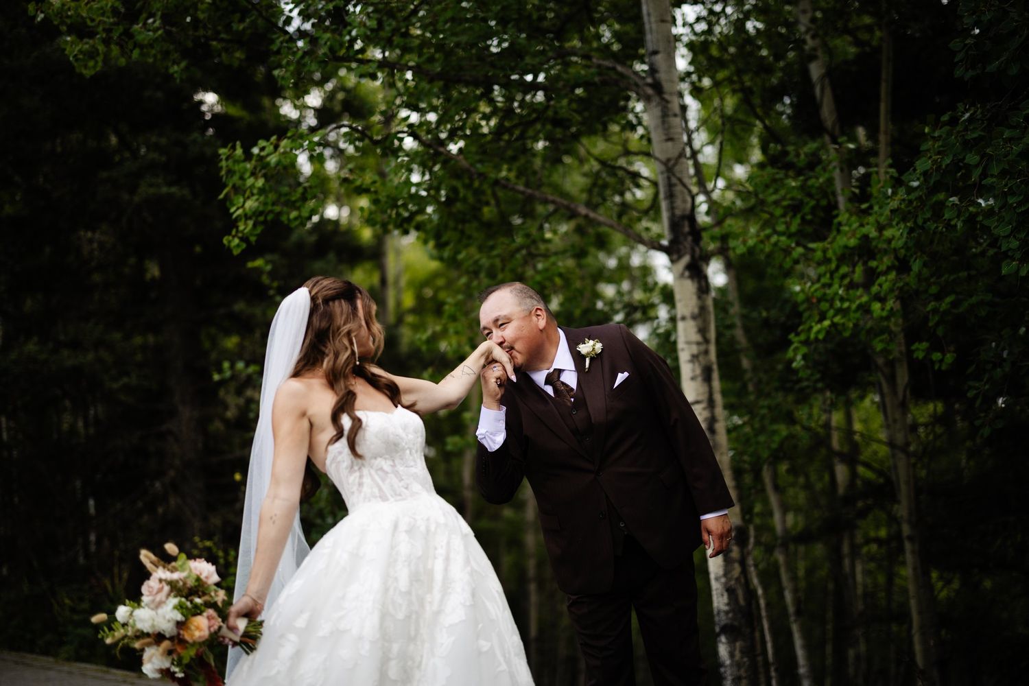Bride's first look with her dad in the forest at Azuridge